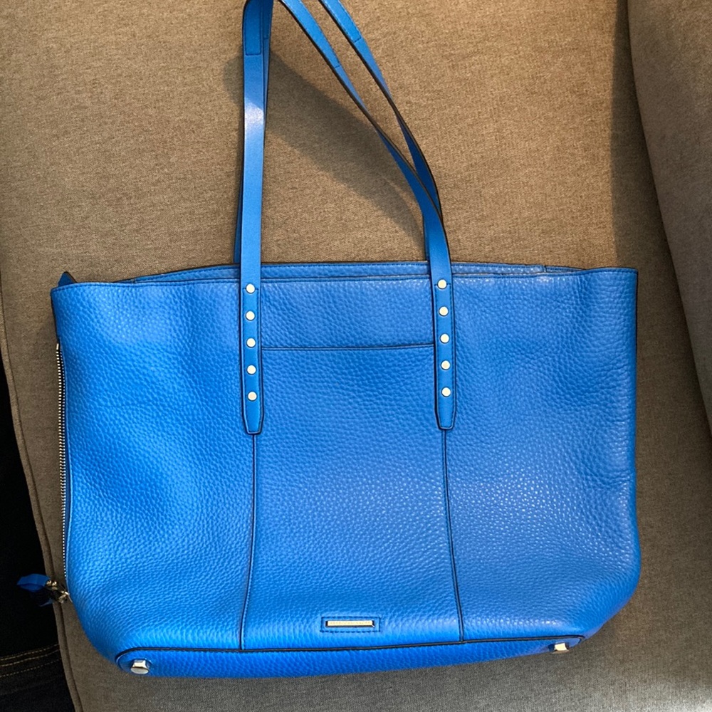 New gorgeous blue color Rebecca Minkoff bag with spacious interior.